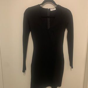 A baton size 2 long sleeve mini dress
